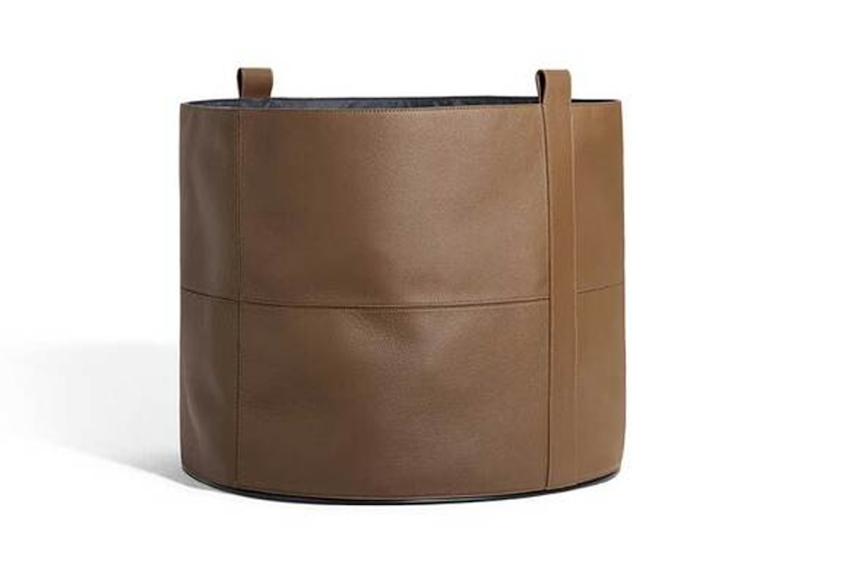 decluttering inizio anno, cesta poltrona frau